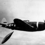 P-47 Thunderbolt 42-75939 „My Jeanne” of the 348th Fighter Group releases a fuel tank during a test flight – February 1944