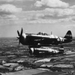 P-47 Thunderbolts 5F-A and 5F-G of the 5th ERS in flight over Lampham