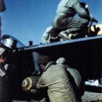 An armament crew of 1st Brazilian FS prepares P-47 for a mission Italy
