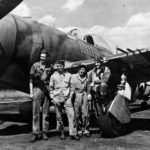 ltCol Gabreski of the 61st FS, 56th Fighter Group stands with the ground crew