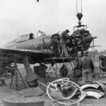 mechanics removing the engine from a P-47 at Duxford September 1943