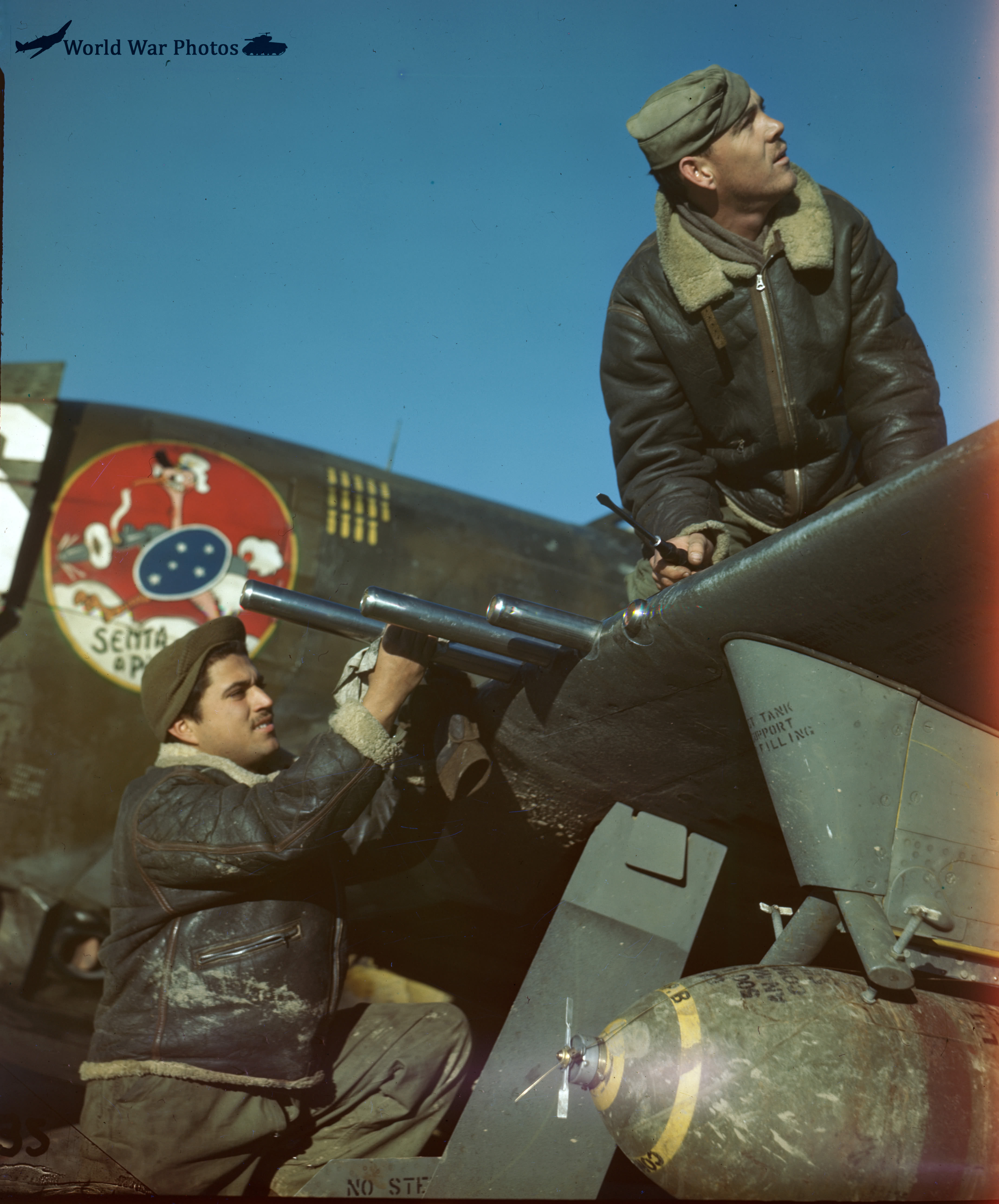 Cleaning guns on a P-47 Thunderbolt 1st Brazilian Fighter Squadron Italy