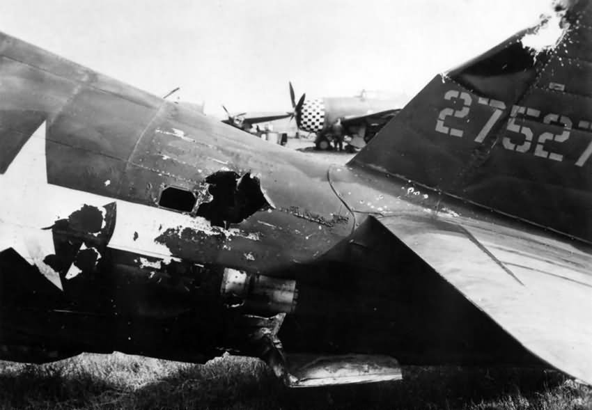 Damaged tail of a P-47 Thunderbolt 42-7527 of the 78th Fighter Group