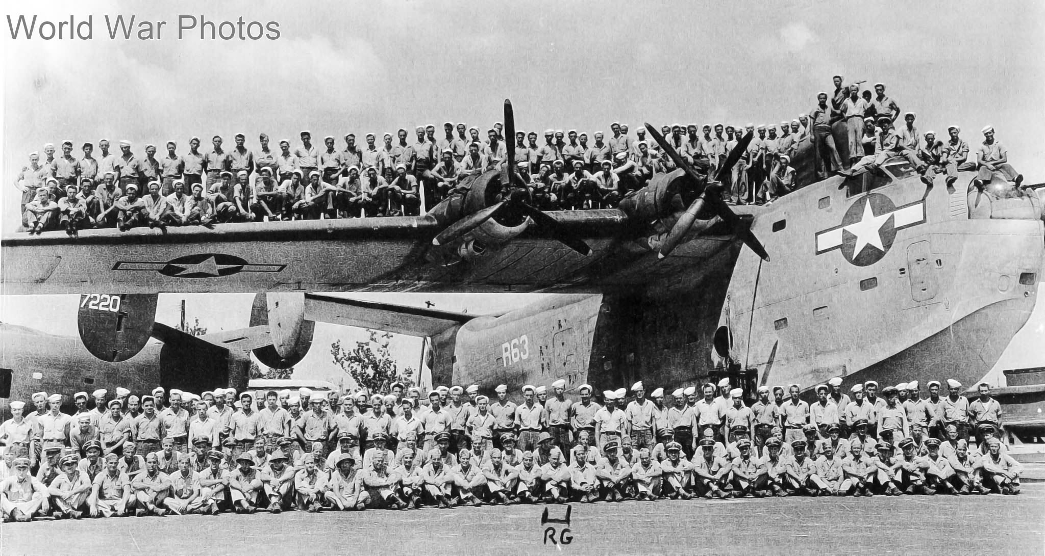 Members of VPB-15 demonstrate the strength of the PB2Y-5’s wings