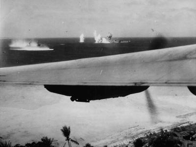 Comdr „Bus” Miller of VB-109 blasts Japanese ships at Kwajalein 1944