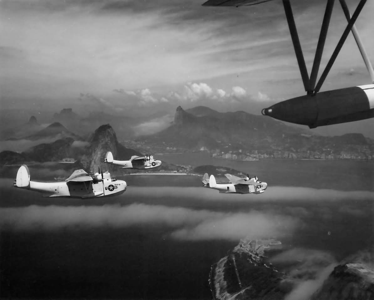Martin PBM-3S Mariners of the VP-211 over shoreline of Rio as they return to base