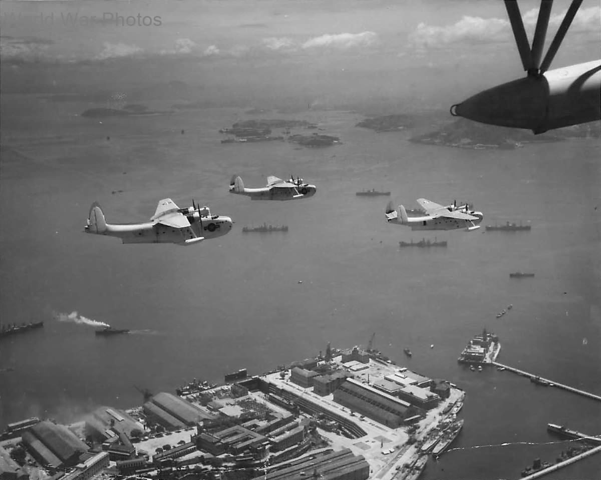 PBM-3S of VP-211 over shoreline of Rio as they return to base 1944 2