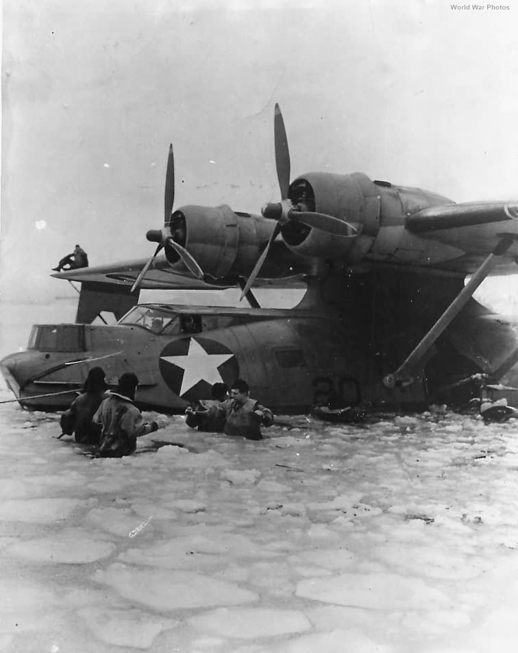 Crew freeing PBY-5A from ice in Alaska 1943