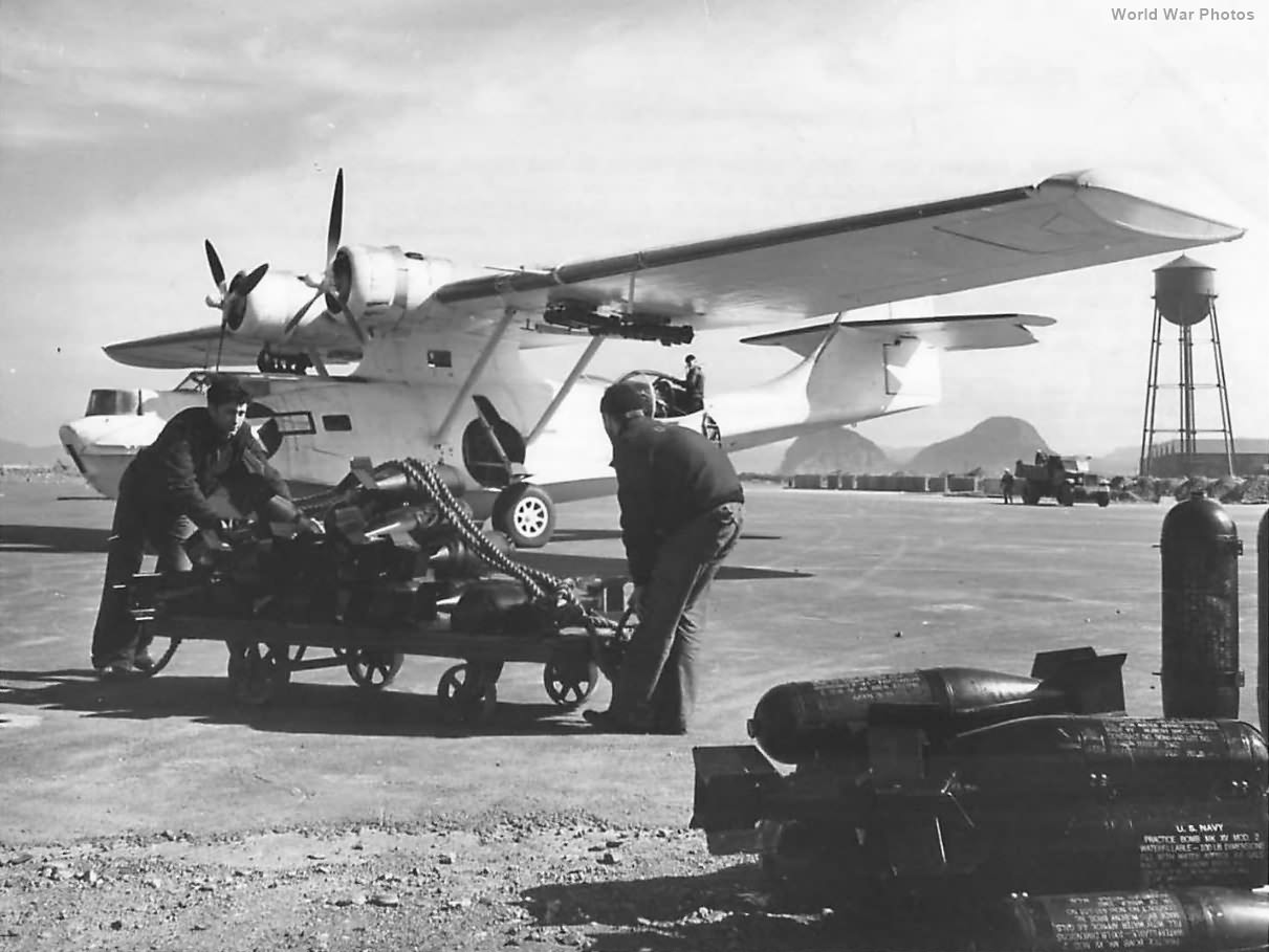 Crew loads practice bombs on Catalina from VP-6 at NAS Argentia 1944
