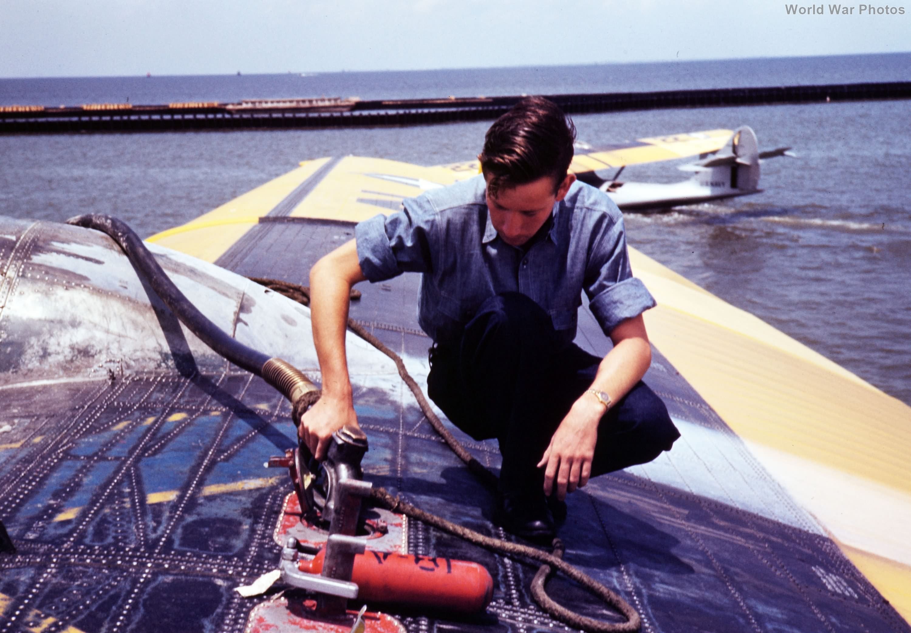 Sailor refueling a PBY trainer at NAS Corpus Christi August 1942