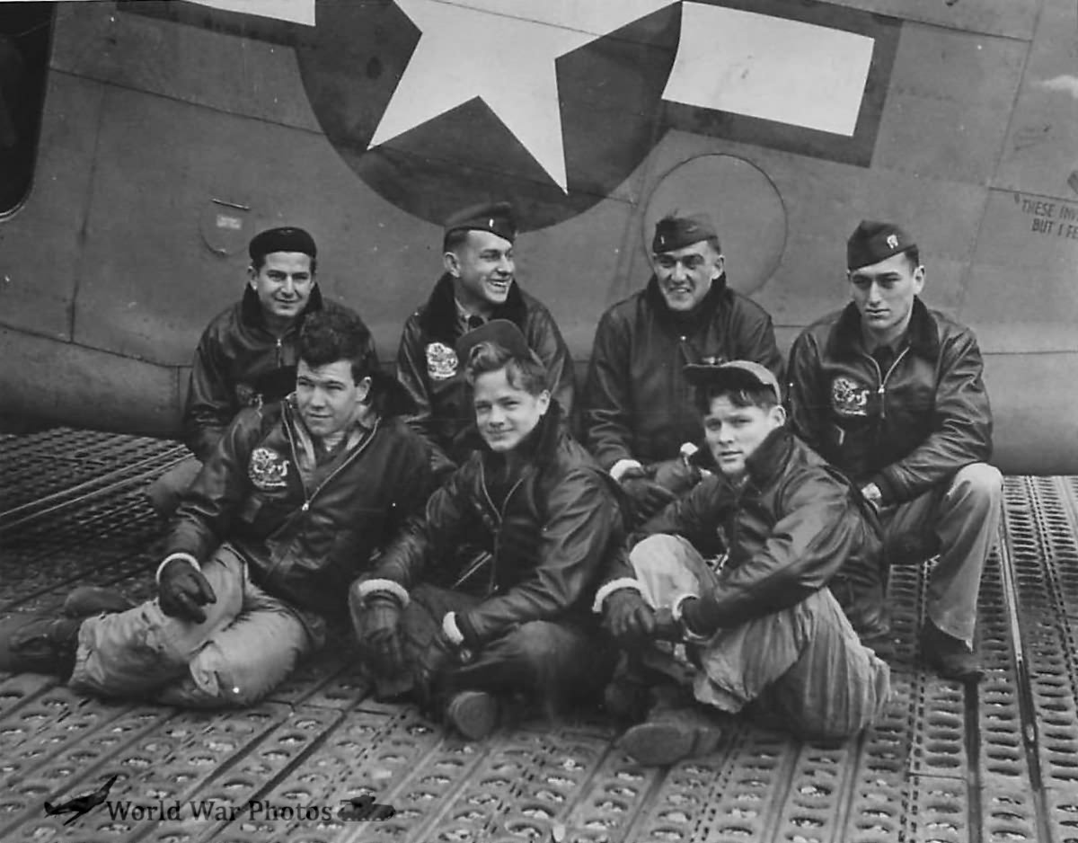 crew members of VPB-135 pose by their PV-1