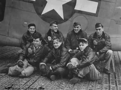 crew members of VPB-135 pose by their PV-1