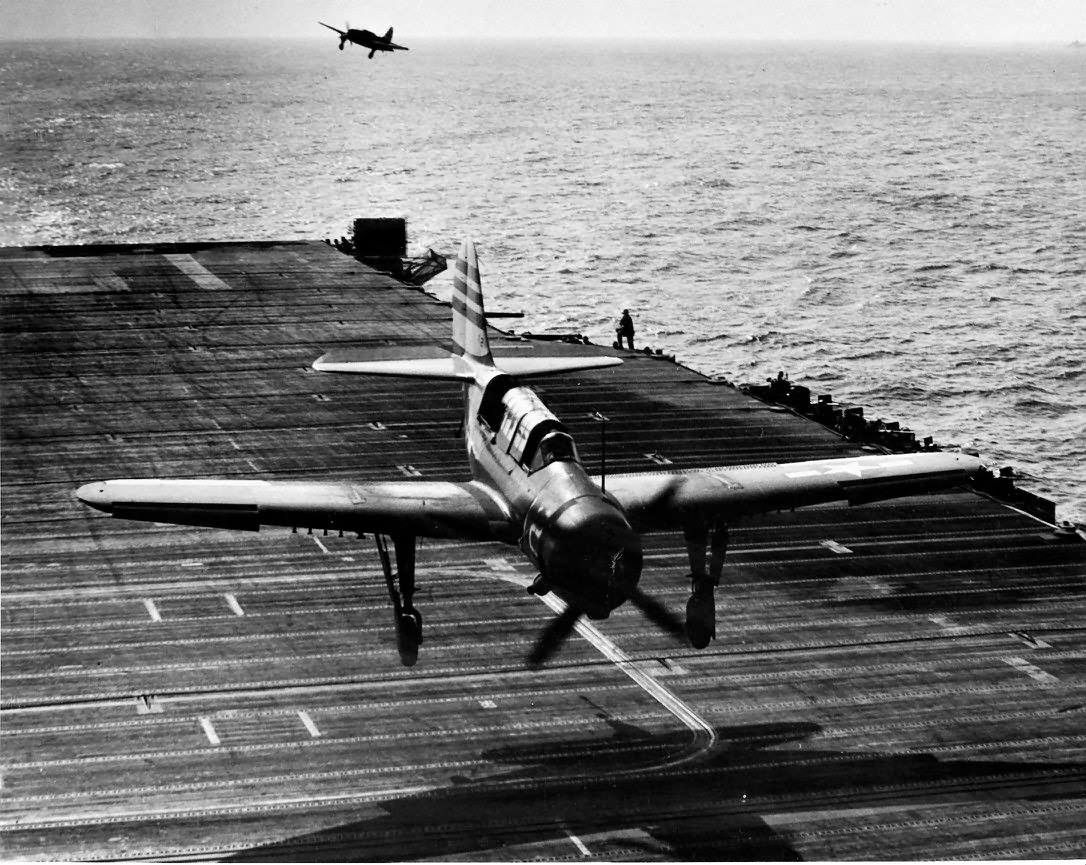 SB2C-4 Helldiver of VB-12 coming in high during a recovery on board USS Randolph (CV-15) in 1945
