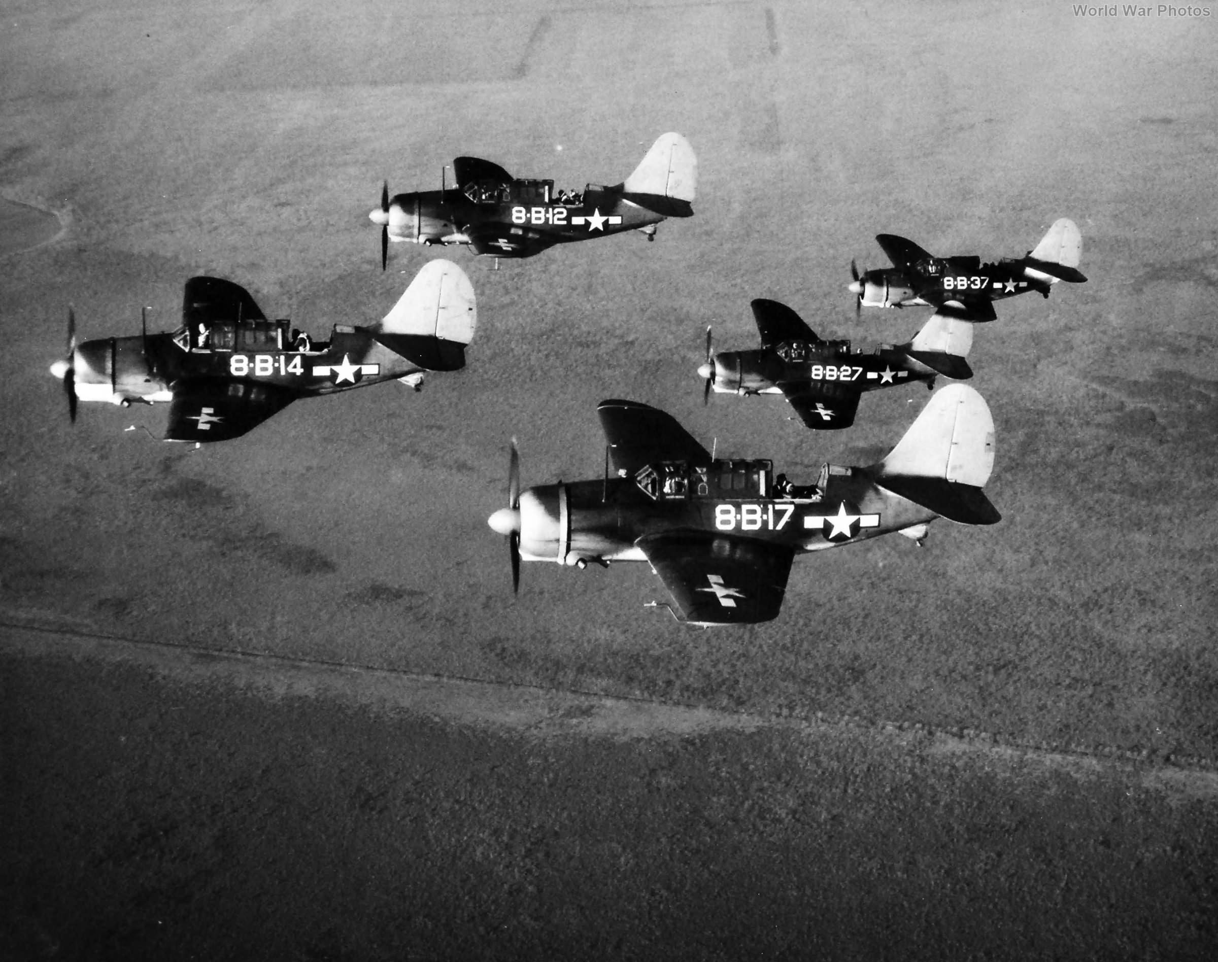 SB2Cs of VB-8 NAS Norfolk fly over surrounding area December 1943