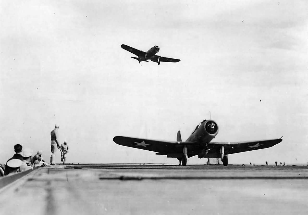 SB2U Vindicator landing on escort aircraft carrier USS Charger CVE-30