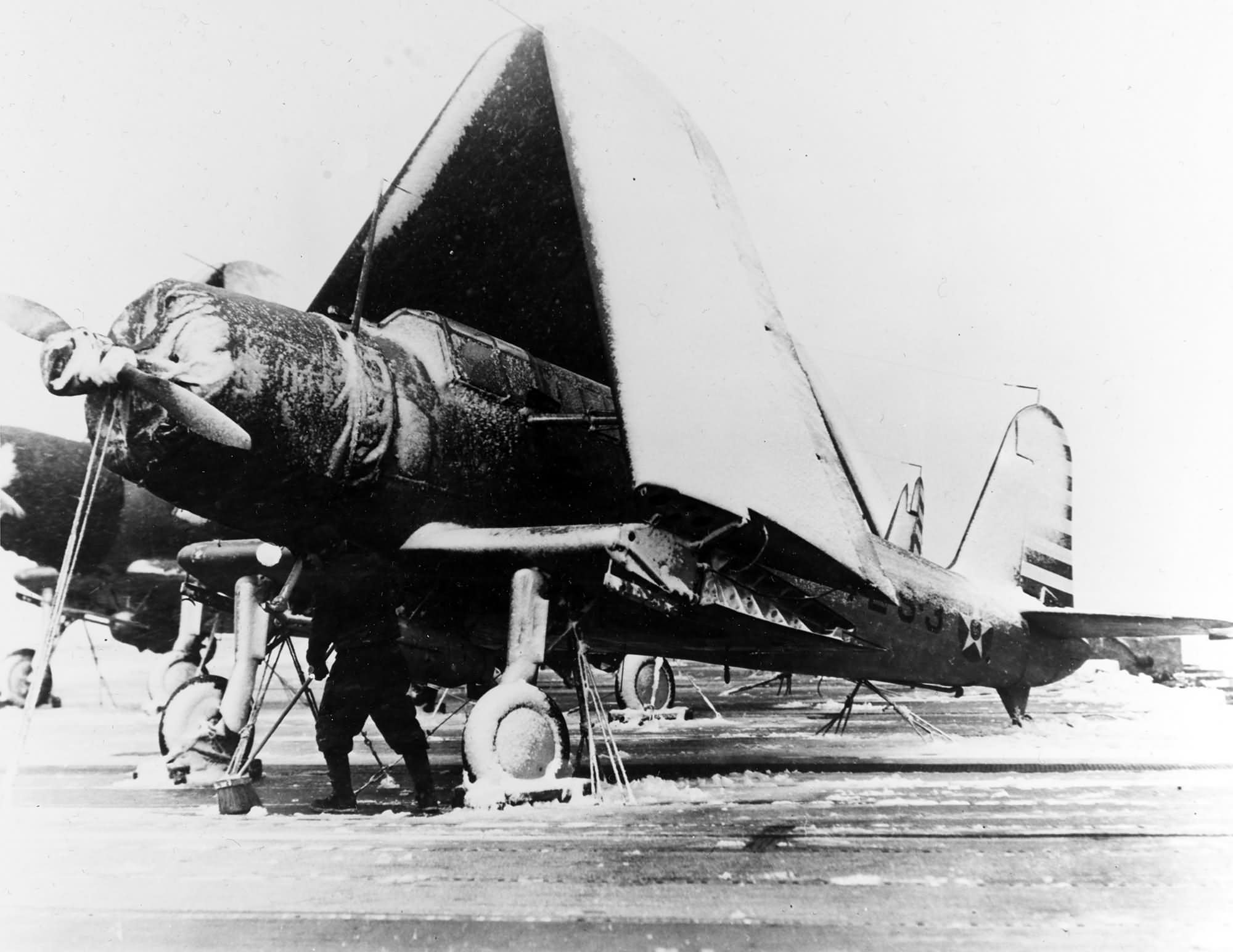 Snow covered SB2U-2 coded 72-S-3 on flight deck USS Wasp CV-7 – 1942