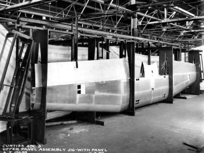 SBC-3 upper wing panel assembly jig with panel