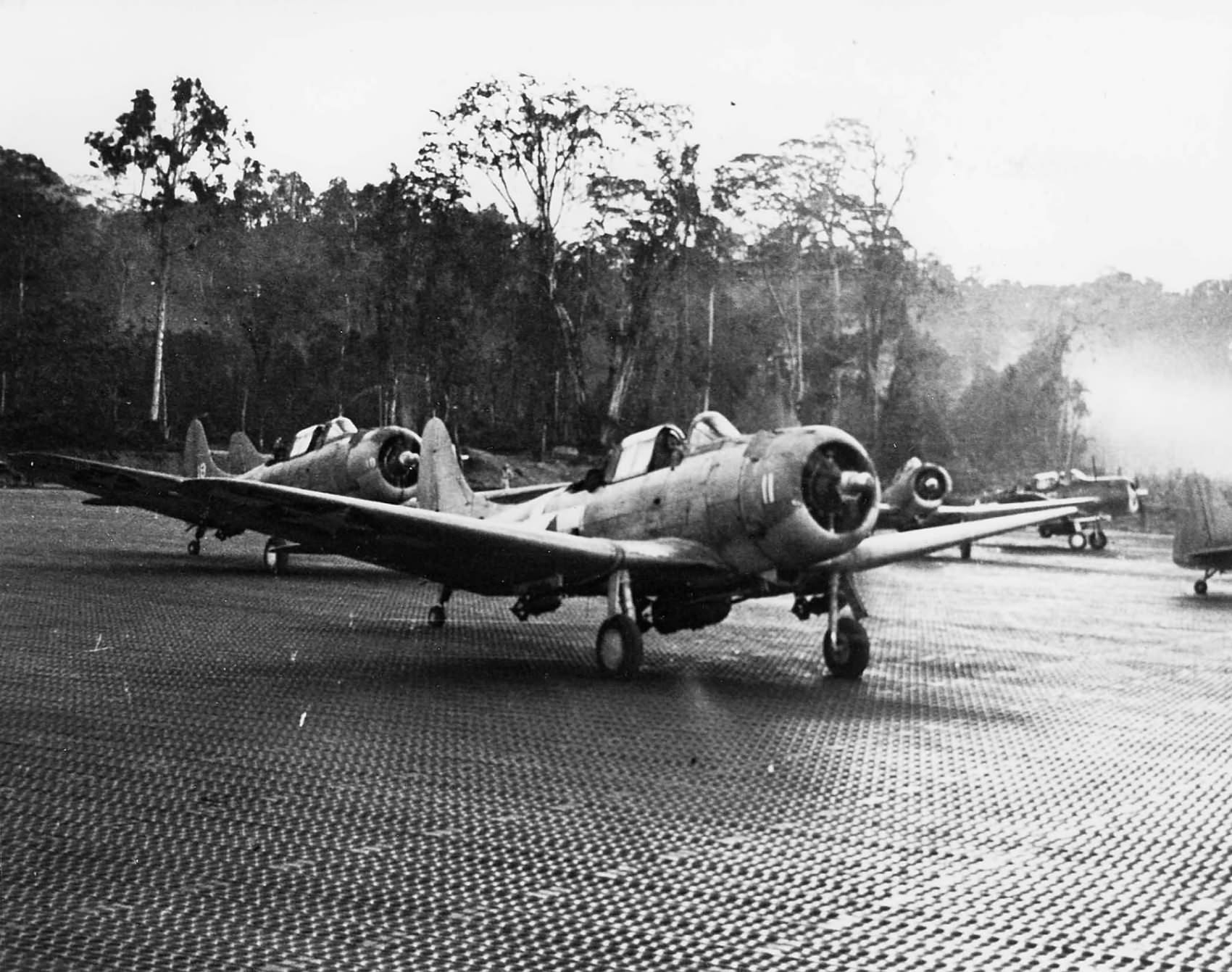 SBD-5 of the VC-40 at Piva Uncle Airstrip Torokina prior to taking off on strike against Talili Bay Rabaul on 6 April 1944