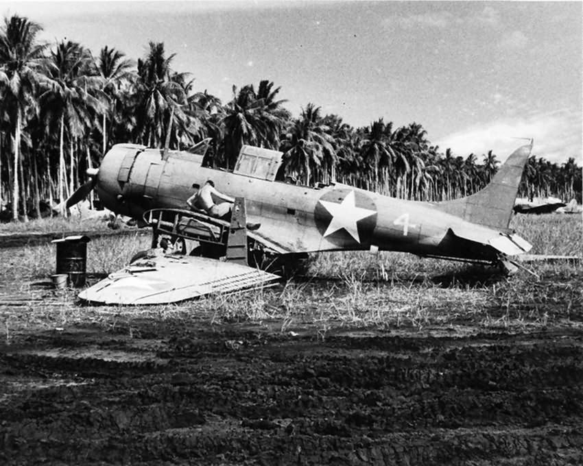 War weary Marine SBD of VMSB-233 in the boneyard at Henderson Field