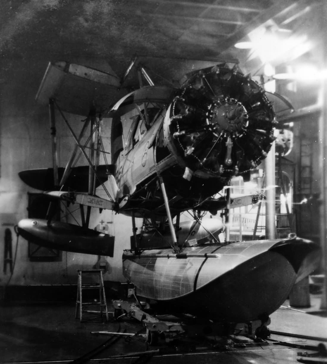 SOC-3 Seagull stripped for maintenance in the hangar of USS Savannah (CL-42) 1938