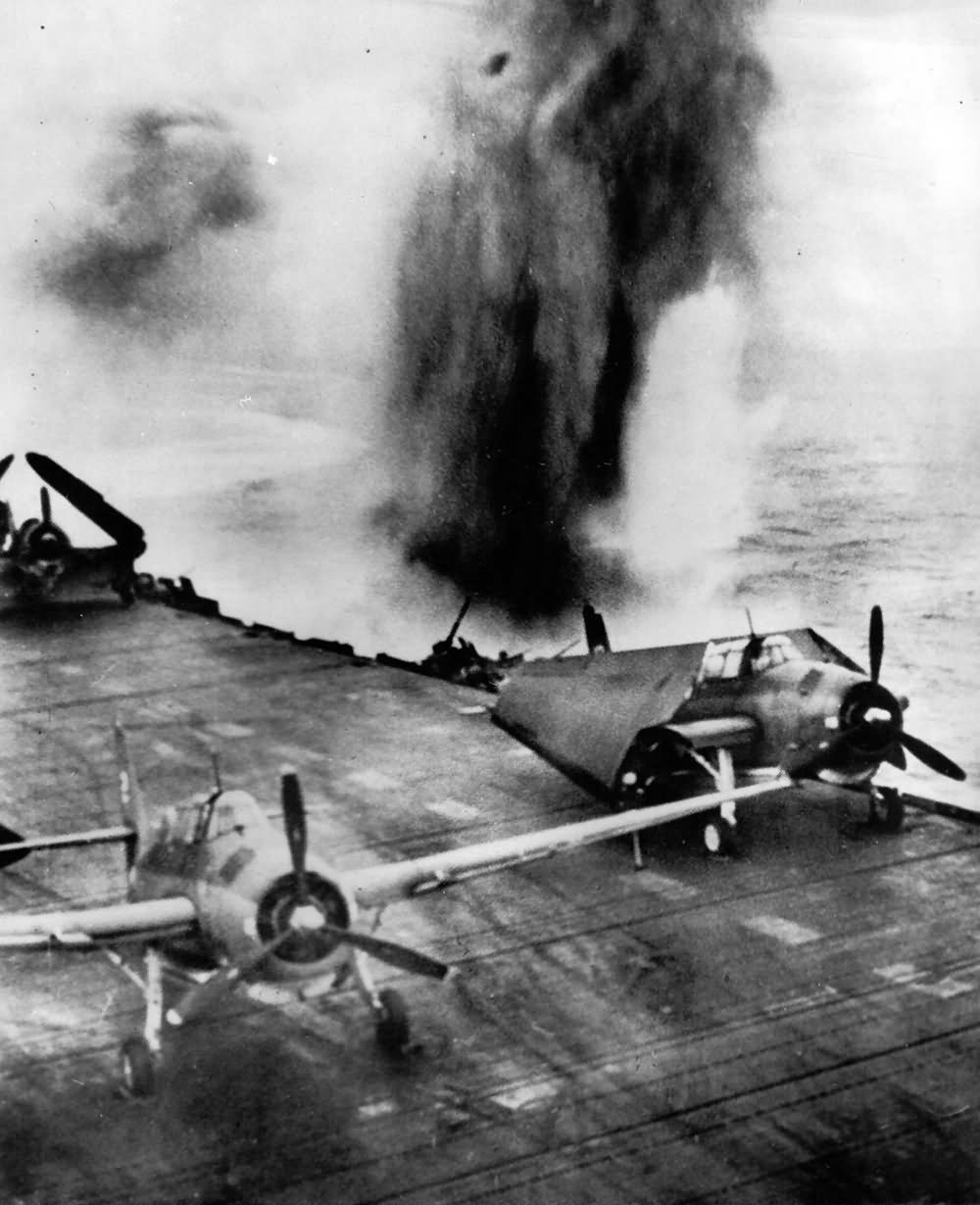 TBF Japanese dive bomber bomb narrowly misses US carrier near Rabaul