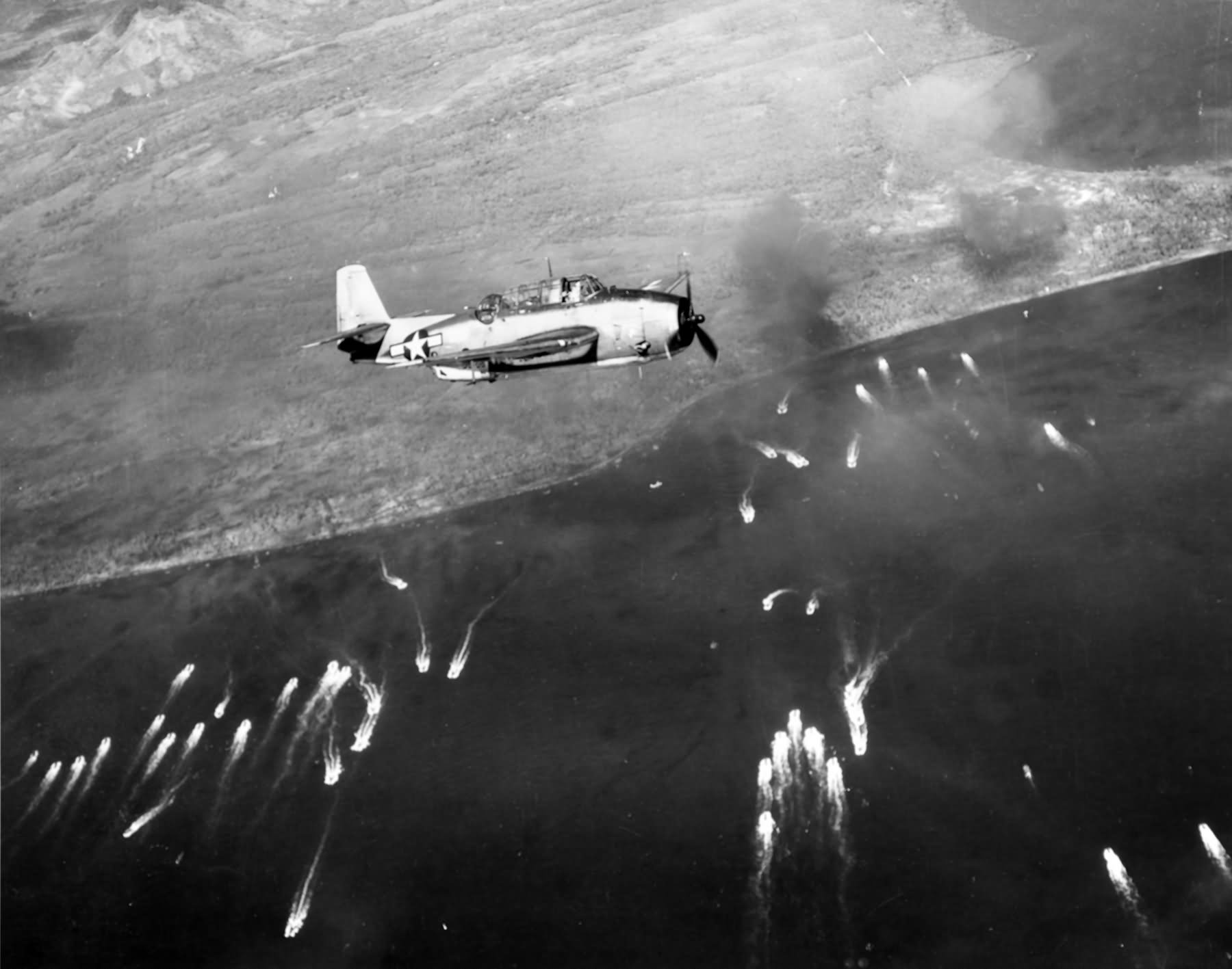 TBF Avenger flying over the landing beaches near Tacloban on 20 October