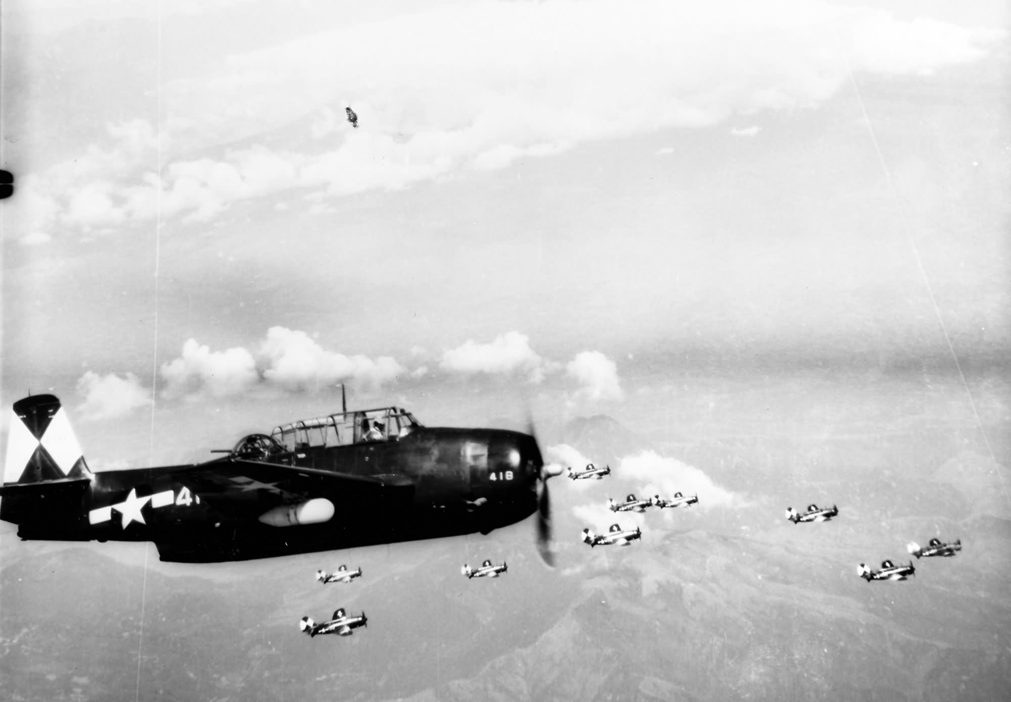 TBM-3E Avenger 418 USS Essex on a raid over Japan on 10 July 1945, Mt. Fujiyama in the background