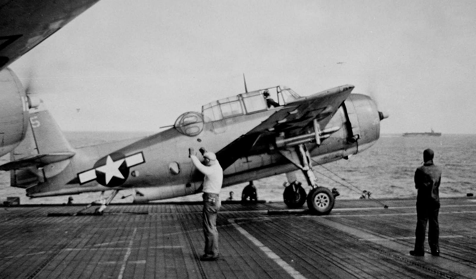 TBM-3 Avenger #5 of VC-84 USS Makin Island (CVE-93) ready to launch, Okinawa on April 3, 1945