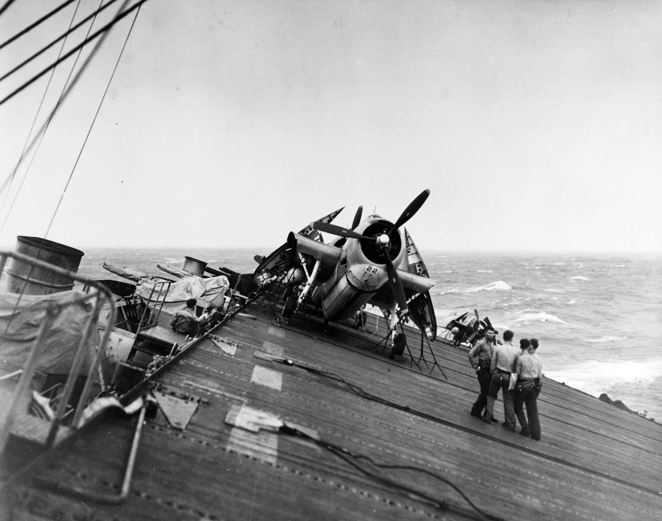 TBF Avenger 22 on deck of carrier USS Anzio CVE-57 during a typhoon east of the Philippines 17 December 1944