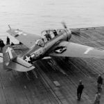 Damaged TBM-3 #301 of VT-84 after it landed aboard the carrier USS Bunker Hill (CV-17) February 19, 1945