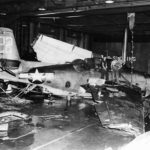 Destroyed TBM Avenger #122 on the hangar deck of the USS Monterey December 19, 1944