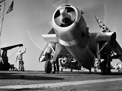 TBF with engine running on board an escort carrier in the Atlantic