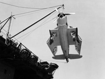 TBF being loaded onboard USS Altamaha May 1943