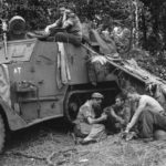Marines by M2 await advance on Cape Gloucester