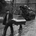 M32 ARV and 3rd Army Troops Pass Germans Carrying Coffin near Coblenz 1945