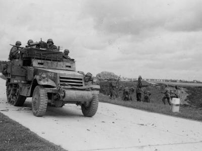 M3A1 halftrack of 3rd Infantry Division and 20th Armored Division Takes POWs Munich Germany 1945