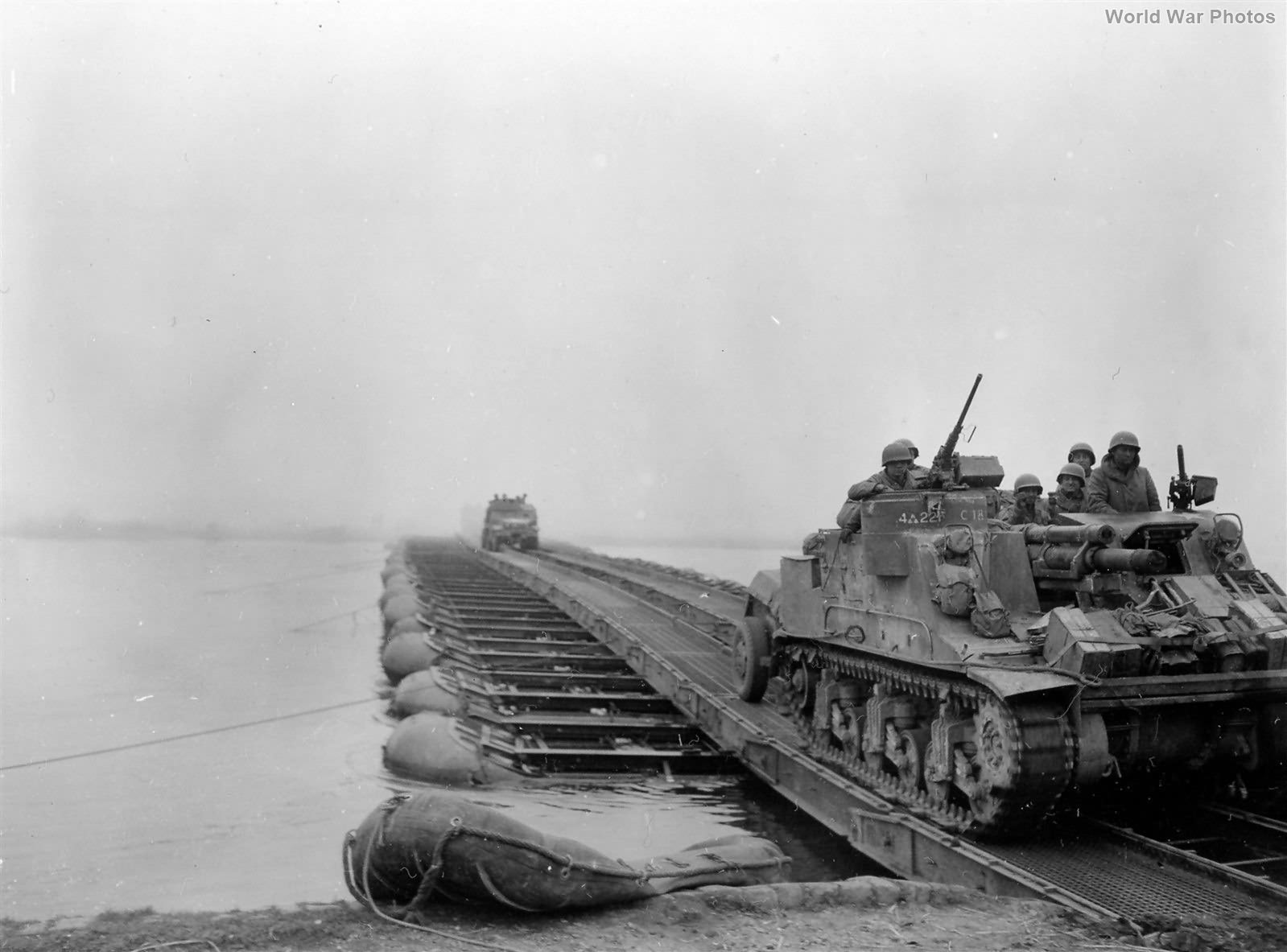 M7 of 4th Armored Division pontoon bridge