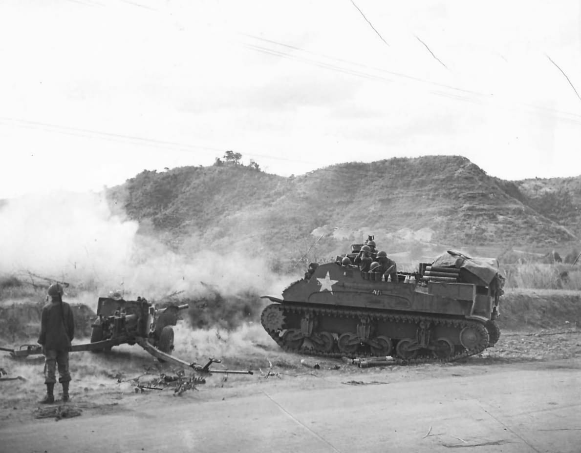 Artillery guns blast Japanese position on Luzon