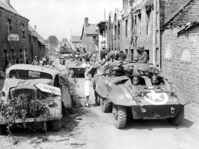 M8 Greyhound Armored Cars of the 2nd Cavalry Group (Mechanized) Enter Brehal Normandy August 2 1944