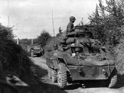 M8 Greyhound of 113th Cav Recon Squadron Spearheads 1st Army Drive into Holland September 1944