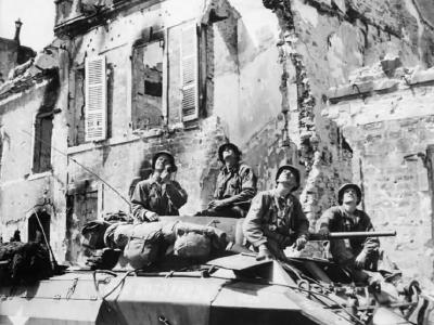 US Soldiers of Recon Unit in M8 Scout Car In Mountebourg France