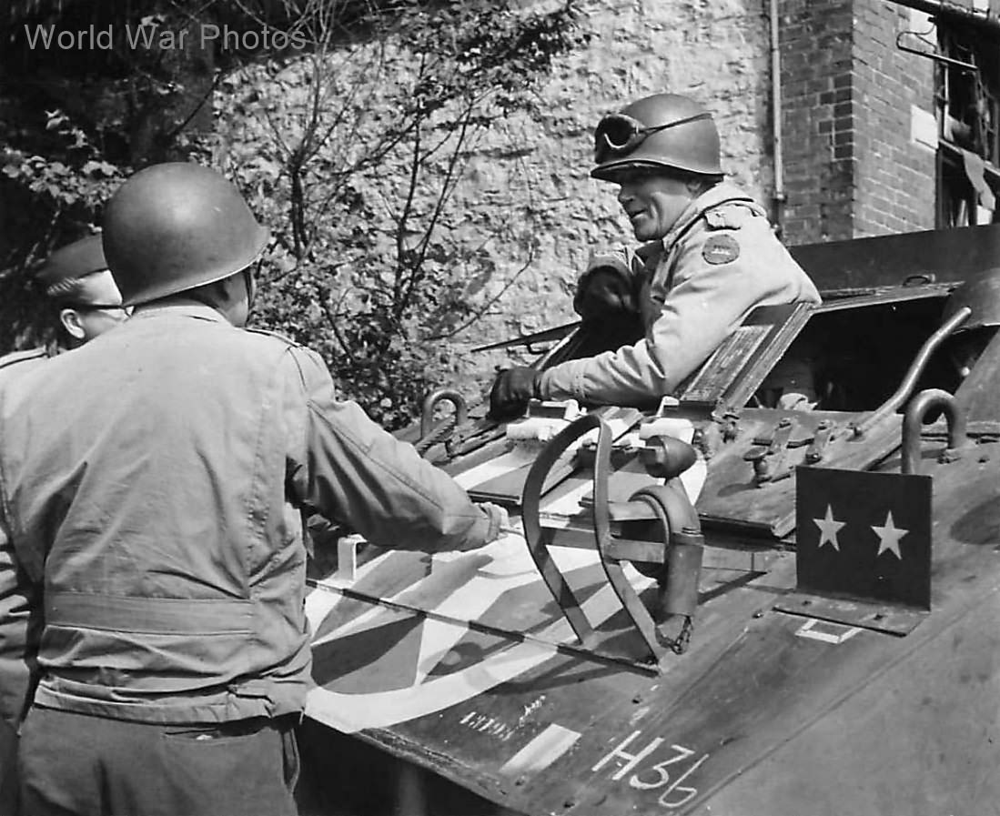 US VII Corps Gen. Collins in M8 Greyhound in Eupen Belgium’ 44
