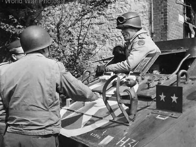 US VII Corps Gen. Collins in M8 Greyhound in Eupen Belgium’ 44