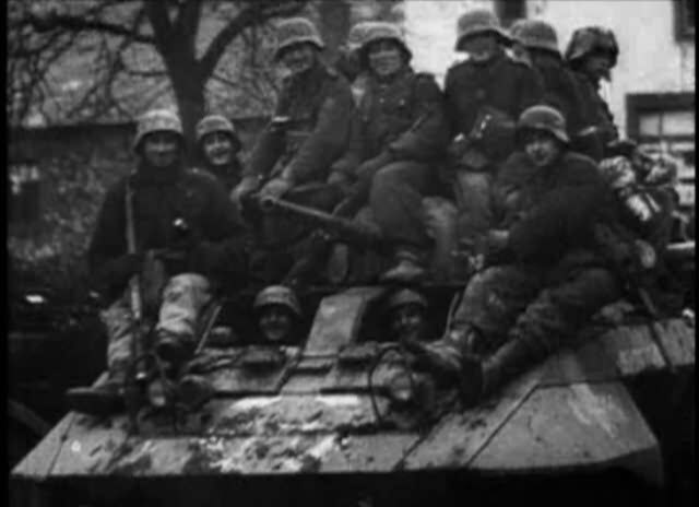 German soldiers and M8 Greyhound