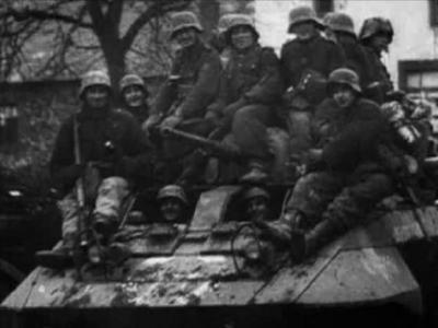 German soldiers and M8 Greyhound