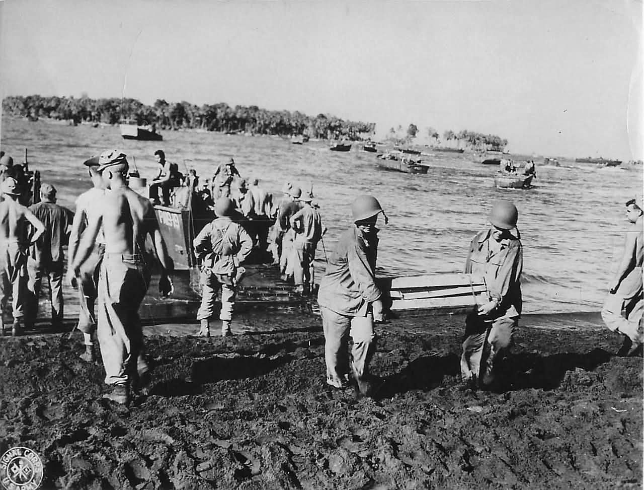 37th Division Troops Unload Ammo on Bougainville Beachhead