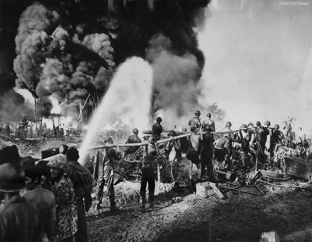 Marines Sailors fight flames as oil dump burns on Bougainville