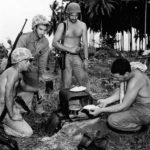 Marines baking pies in field oven on Bougainville