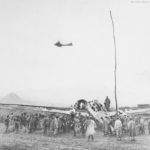 Marine and wrecked Japanese plane at Cape Gloucester airfield