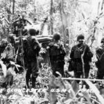 Marines and Sherman advancing on Cape Gloucester